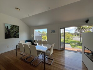 Dining area with doors opening and views to Golf course
