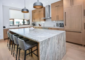 Fully Stocked Kitchen with Island/Breakfast Bar