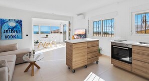 Enjoy a Mediterranean view from the kitchen, blending simplicity with warmth.