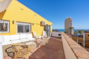 Lounge with a stunning Mediterranean view - enjoy the full 40m² terrace!