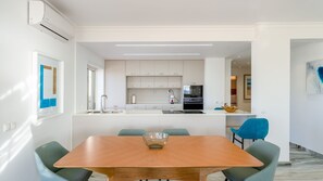 Fully equipped kitchen with sleek cabinetry and modern appliances for effortless cooking. #ModernLiving #KitchenGoals