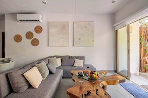 Tulum City Apartments - Puerta Zama T103
Sala de estar amplia e iluminada