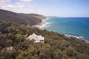 Tucked away in the hills, this home offers a stunning locale and grand proportions. 