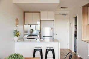 The kitchen is immaculately appointed with everything you need to prepare home-cooked meals.