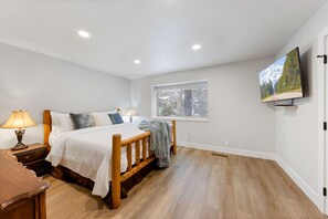 Exceptionally comfortable king size bed with huge TV in master.