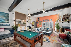 Game Room with sleeping for 4 and access to the backyard waterfront views!