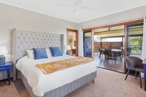 Master bedroom with deluxe king size bed and views of the Gold Coast. 