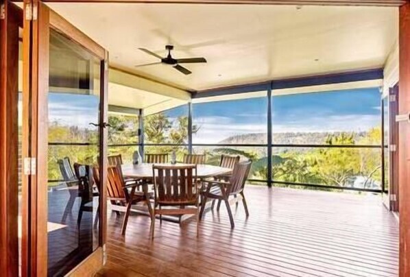 Breathtaking, spacious balcony overlooking the coastal views and lush valley.