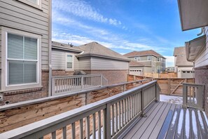 Enjoy peaceful mornings or evenings on your private balcony, complete with scenic views of the quiet neighborhood.