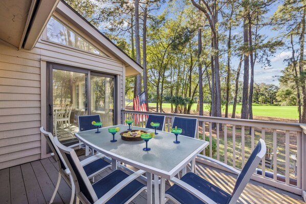 Escape to 24 Muirfield, an end villa with stunning golf course views of the Harbour Town Golf Links 2nd Fairway.