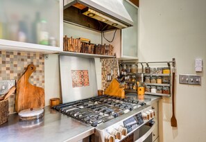 This chef's kitchen is ready for you with a professional-grade range!
