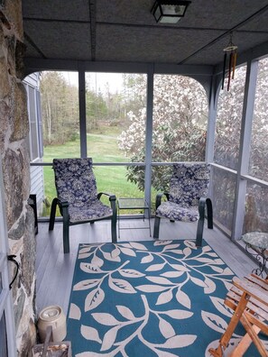 Cozy screened-in porch for those warm-season evenings