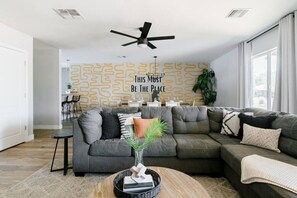 Cozy living room with plenty of seating space for everyone.