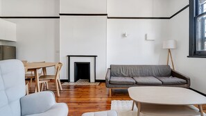 Polished timber floors complement the minimalist decor.
