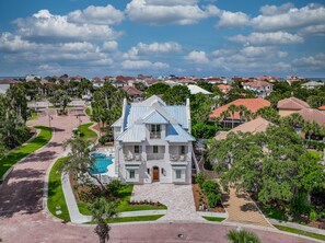 A Dreamy Drone Shot of A Sprawling Beach Oasis, Only a Short Ride to the Crab Trap