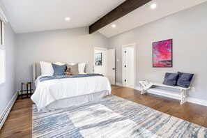  Unwind in a king-size bed with an ensuite bathroom and a serene sitting space.