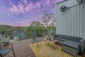 A cozy urban retreat with a balcony to enjoy the vibrant sights and sounds of the city.