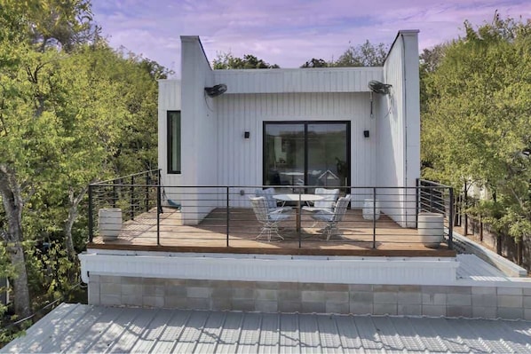 Perfect for enjoying the energy of the city while having a peaceful moment on your balcony.