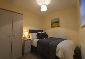 A charming retreat offering comfort and a touch of traditional style