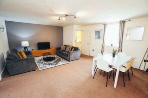 Enjoy your favorite shows or unwind with a book in this comfortable lounge.