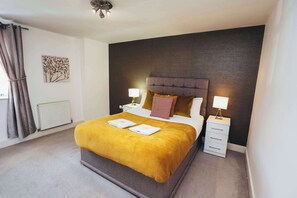 A serene bedroom with a comfortable double bed for a great night’s sleep.