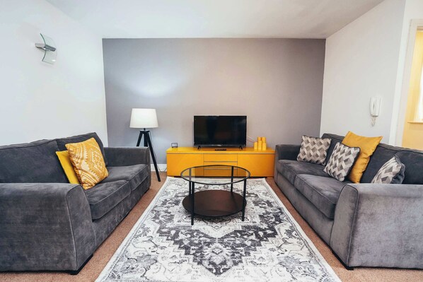 A bright and stylish living area, perfect for relaxing after a day of exploring Derby.