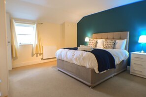 Whether you’re working or resting, this bedroom has everything you need