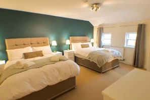 Relax and recharge in this stylishly designed bedroom