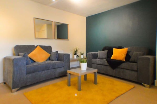 Kick back, grab the remote, and stream your favorites on Netflix in this cosy lounge