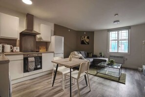 A bright and airy kitchen with all essential appliances, perfect for cooking during your stay