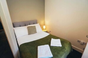 Whether you’re working or resting, this bedroom has everything you need