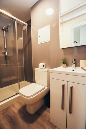 Step into luxury in this sleek, fully-equipped bathroom