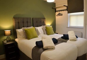 Whether you’re working or resting, this bedroom has everything you need