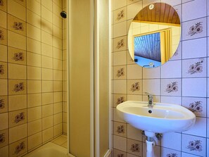 Wall, Flooring, Wood, Floor, Yellow, Interior Design, Plumbing Fixture, Bathroom, Bathroom Sink, Room