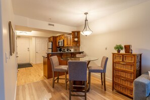 A view of the dining area flowing seamlessly into the kitchen, perfect for entertaining.