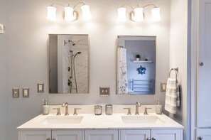 "Dual sinks and elegant design for a spa-like experience."