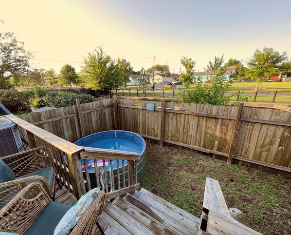 Cool off in the cowboy pool or on the back porch overlooking the Lafitte Greenway!
