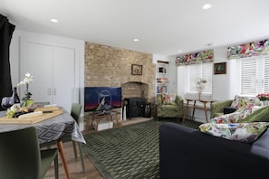 Exposed stonework in the beautiful open-plan living area