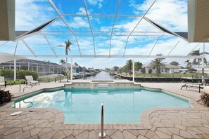 Free Heated pool with a open canal view