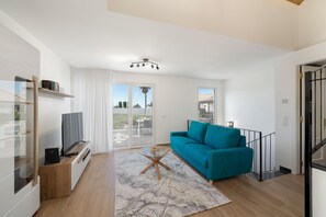 The Lounge Area Of Chalet Prazeres With View To The Front Terrace