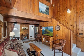 Curl up in the cozy living room & stream your favorites on the smart TV