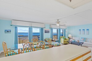 The Living Area is Light and Bright with Nautical Blue, Beachy Decor, and comfy Furniture!