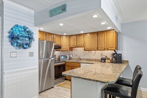 The Chef in the family will be delighted by how well stocked the kitchen is, as well as tons of cabinets and work space.