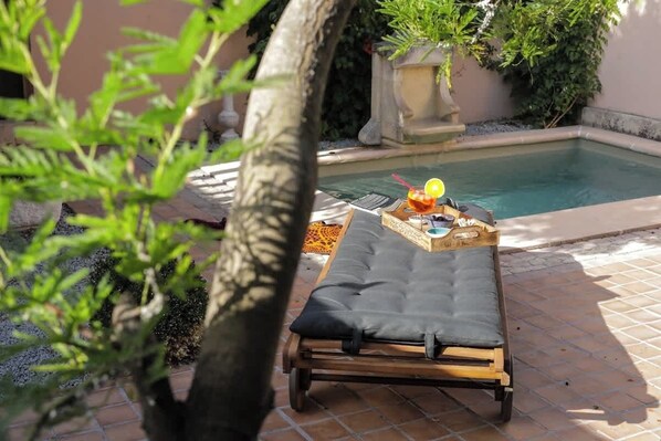 Sunbed, Terrace, Swimming pool, Outdoor furniture