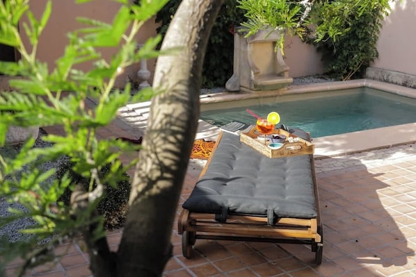 Sunbed, Terrace, Swimming pool, Outdoor furniture