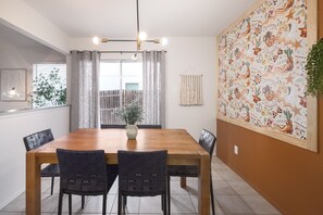 Our dining space can seat 6 people comfortably with access to the outdoor patio.