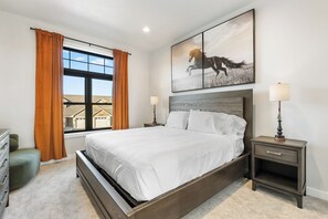 Bedroom #2 (upper level): King size bed, TV, hangers, extra pillows and blankets