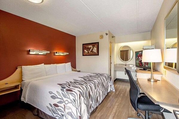 Unit with 1 King bed. Exact unit will be assigned upon arrival. Views, colors, and decor may vary.