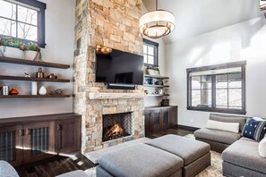 Our great room with vaulted ceilings and fireplace