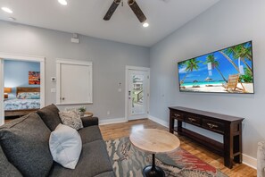 1st floor suite with bedroom  in background and separate front door entrance